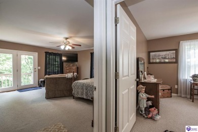 Lakefront Living at Its Finest! This stunning ranch-style home on Doe Valley Country Club in Kentucky - for sale on GolfHomes.com, golf home, golf lot