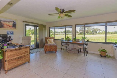 This charming home sits pretty on an oversized lot with stunning on Eagle Wood Golf Course in Florida - for sale on GolfHomes.com, golf home, golf lot