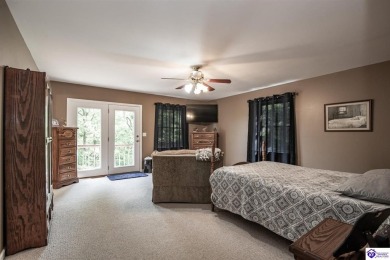 Lakefront Living at Its Finest! This stunning ranch-style home on Doe Valley Country Club in Kentucky - for sale on GolfHomes.com, golf home, golf lot