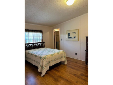 Welcome to Paradise! Paradise island is a 55+ active community on Fairway Village Golf Course in Florida - for sale on GolfHomes.com, golf home, golf lot