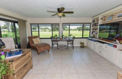 This charming home sits pretty on an oversized lot with stunning on Eagle Wood Golf Course in Florida - for sale on GolfHomes.com, golf home, golf lot