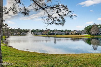 LAKEFRONT fountain views set the tone for this exceptional POOL on Plantation Bay Golf and Country Club in Florida - for sale on GolfHomes.com, golf home, golf lot