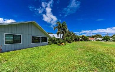 This charming home sits pretty on an oversized lot with stunning on Eagle Wood Golf Course in Florida - for sale on GolfHomes.com, golf home, golf lot