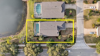 LAKEFRONT fountain views set the tone for this exceptional POOL on Plantation Bay Golf and Country Club in Florida - for sale on GolfHomes.com, golf home, golf lot