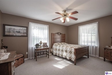 Lakefront Living at Its Finest! This stunning ranch-style home on Doe Valley Country Club in Kentucky - for sale on GolfHomes.com, golf home, golf lot