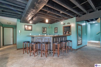 Lakefront Living at Its Finest! This stunning ranch-style home on Doe Valley Country Club in Kentucky - for sale on GolfHomes.com, golf home, golf lot
