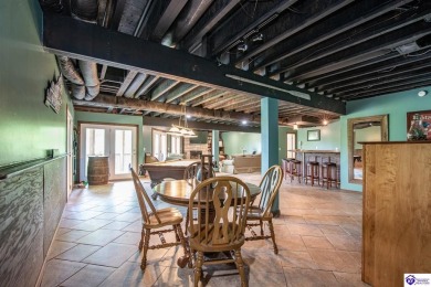 Lakefront Living at Its Finest! This stunning ranch-style home on Doe Valley Country Club in Kentucky - for sale on GolfHomes.com, golf home, golf lot