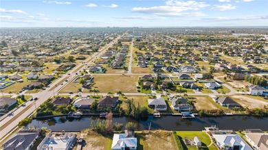 BUILD a custom waterfront pool Home on this oversized Gulf on Royal Tee Country Club in Florida - for sale on GolfHomes.com, golf home, golf lot
