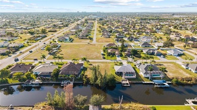 BUILD a custom waterfront pool Home on this oversized Gulf on Royal Tee Country Club in Florida - for sale on GolfHomes.com, golf home, golf lot