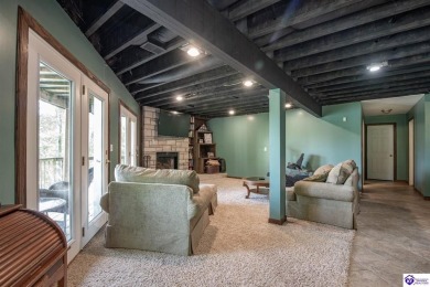 Lakefront Living at Its Finest! This stunning ranch-style home on Doe Valley Country Club in Kentucky - for sale on GolfHomes.com, golf home, golf lot