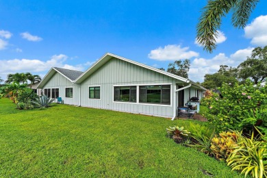 This charming home sits pretty on an oversized lot with stunning on Eagle Wood Golf Course in Florida - for sale on GolfHomes.com, golf home, golf lot