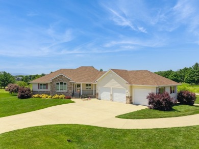 Discover the space and comfort of this phenomenal walk-out ranch on River Valley Golf Course in Iowa - for sale on GolfHomes.com, golf home, golf lot