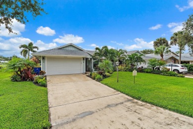 This charming home sits pretty on an oversized lot with stunning on Eagle Wood Golf Course in Florida - for sale on GolfHomes.com, golf home, golf lot
