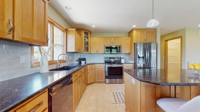 Discover the space and comfort of this phenomenal walk-out ranch on River Valley Golf Course in Iowa - for sale on GolfHomes.com, golf home, golf lot