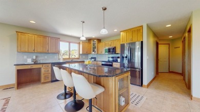 Discover the space and comfort of this phenomenal walk-out ranch on River Valley Golf Course in Iowa - for sale on GolfHomes.com, golf home, golf lot