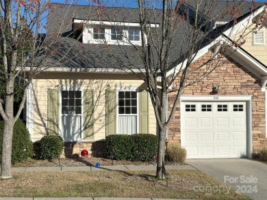 This immaculate townhome is freshly painted with dramatic high on Tega Cay Golf Club in South Carolina - for sale on GolfHomes.com, golf home, golf lot