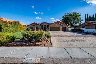 ***This gorgeous home backs up to the 7th hole of Cerbat Cliffs on Cerbat Cliffs Golf Course in Arizona - for sale on GolfHomes.com, golf home, golf lot