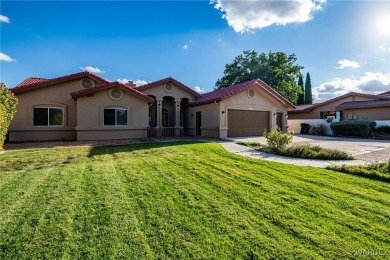 ***This gorgeous home backs up to the 7th hole of Cerbat Cliffs on Cerbat Cliffs Golf Course in Arizona - for sale on GolfHomes.com, golf home, golf lot