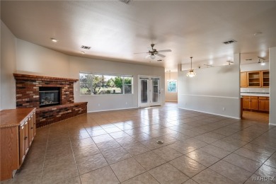 ***This gorgeous home backs up to the 7th hole of Cerbat Cliffs on Cerbat Cliffs Golf Course in Arizona - for sale on GolfHomes.com, golf home, golf lot