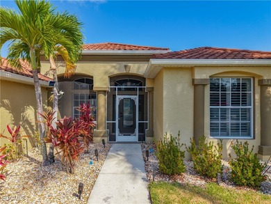 Breathtaking Waterfront Living in the Heart of Herons Glen Step on Herons Glen Golf and Country Club in Florida - for sale on GolfHomes.com, golf home, golf lot