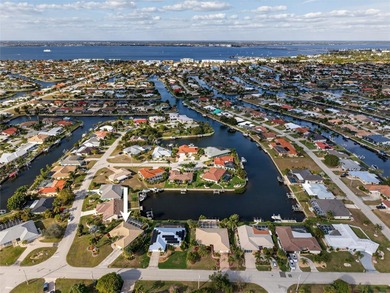 PUNTA GORDA ISLES! 10-MINUTE POWERBOAT ACCESS TO CHARLOTTE on Saint Andrews South Golf Club in Florida - for sale on GolfHomes.com, golf home, golf lot