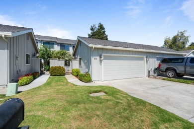 Light-filled townhouse featuring a kitchen with granite counters on Ridgemark Golf and Country Club in California - for sale on GolfHomes.com, golf home, golf lot