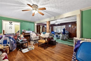 Nestled on one of the largest residential lots in the charming on College Park Municipal Golf Course in Georgia - for sale on GolfHomes.com, golf home, golf lot