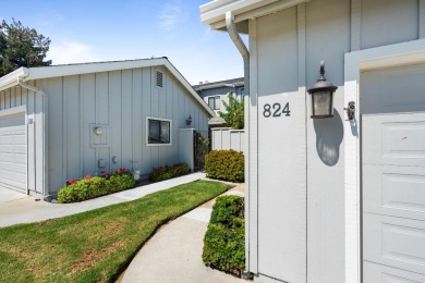 Light-filled townhouse featuring a kitchen with granite counters on Ridgemark Golf and Country Club in California - for sale on GolfHomes.com, golf home, golf lot