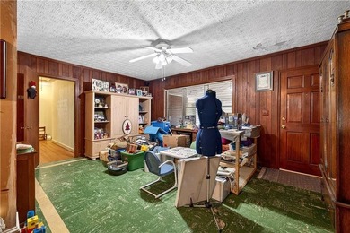 Nestled on one of the largest residential lots in the charming on College Park Municipal Golf Course in Georgia - for sale on GolfHomes.com, golf home, golf lot