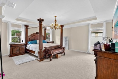 This 6-bedroom, 3.5-bath pool home in the gated North Shore at on North Shore Golf Club in Florida - for sale on GolfHomes.com, golf home, golf lot