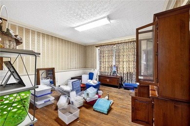 Nestled on one of the largest residential lots in the charming on College Park Municipal Golf Course in Georgia - for sale on GolfHomes.com, golf home, golf lot