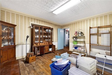 Nestled on one of the largest residential lots in the charming on College Park Municipal Golf Course in Georgia - for sale on GolfHomes.com, golf home, golf lot