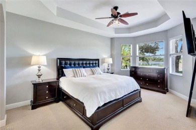 Enjoy sparkling lake and serene golf course views in this on Valencia Golf and Country Club in Florida - for sale on GolfHomes.com, golf home, golf lot