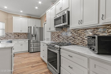 Enjoy fantastic golf course scenery from this Wedgewood property on Spruce Creek Golf Club in Florida - for sale on GolfHomes.com, golf home, golf lot