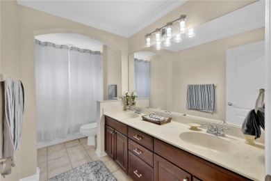 This 6-bedroom, 3.5-bath pool home in the gated North Shore at on North Shore Golf Club in Florida - for sale on GolfHomes.com, golf home, golf lot