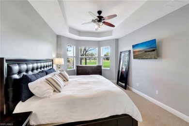 Enjoy sparkling lake and serene golf course views in this on Valencia Golf and Country Club in Florida - for sale on GolfHomes.com, golf home, golf lot