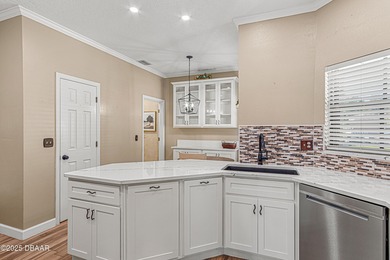 Enjoy fantastic golf course scenery from this Wedgewood property on Spruce Creek Golf Club in Florida - for sale on GolfHomes.com, golf home, golf lot