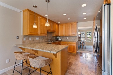 Light-filled townhouse featuring a kitchen with granite counters on Ridgemark Golf and Country Club in California - for sale on GolfHomes.com, golf home, golf lot