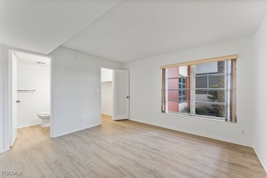 Step inside this classic Naples condo situated on The Hibiscus on Hibiscus Golf Club in Florida - for sale on GolfHomes.com, golf home, golf lot