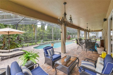This 6-bedroom, 3.5-bath pool home in the gated North Shore at on North Shore Golf Club in Florida - for sale on GolfHomes.com, golf home, golf lot