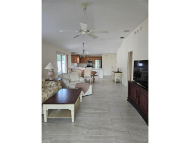 LOCATION, VIEWS. Multiple waterfront and golf course views on Mallory Hill Golf and Country Club in Florida - for sale on GolfHomes.com, golf home, golf lot