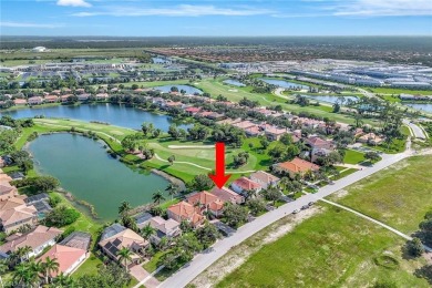 Enjoy sparkling lake and serene golf course views in this on Valencia Golf and Country Club in Florida - for sale on GolfHomes.com, golf home, golf lot