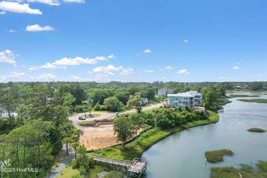 If you've been watching for the perfect coastal home, this on Brick Landing Plantation Yacht and Golf Club in North Carolina - for sale on GolfHomes.com, golf home, golf lot
