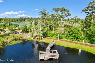 If you've been watching for the perfect coastal home, this on Brick Landing Plantation Yacht and Golf Club in North Carolina - for sale on GolfHomes.com, golf home, golf lot