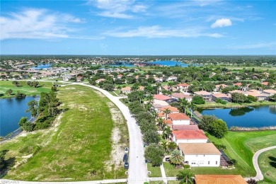 Enjoy sparkling lake and serene golf course views in this on Valencia Golf and Country Club in Florida - for sale on GolfHomes.com, golf home, golf lot