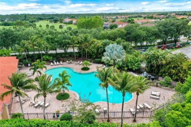 Enjoy sparkling lake and serene golf course views in this on Valencia Golf and Country Club in Florida - for sale on GolfHomes.com, golf home, golf lot
