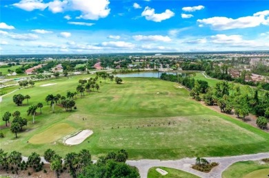 Enjoy sparkling lake and serene golf course views in this on Valencia Golf and Country Club in Florida - for sale on GolfHomes.com, golf home, golf lot