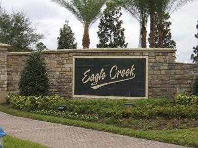 Located in one of the most desirable area, experience a on Eagle Creek Golf Club in Florida - for sale on GolfHomes.com, golf home, golf lot