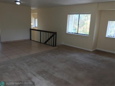 THIS 3 BEDROOM 2 BATH CONDO HAS NEW PAINT, NEW CARPET AND HAS on Jacaranda Golf Club in Florida - for sale on GolfHomes.com, golf home, golf lot