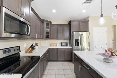 Spacious  upgraded 5-bedroom, 3-bath home located on a desirable on The Legacy Golf Resort in Arizona - for sale on GolfHomes.com, golf home, golf lot